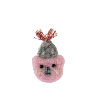 Cute pink wool felt bear head brooch with a gray polka dot hat and colorful tassels