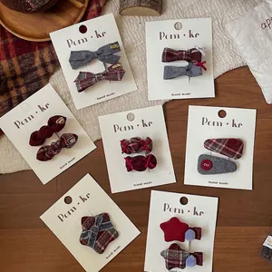 Classic plaid fabric hair clip set with handmade bow designs for women and girls