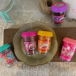 Kids colorful hair elastics in cute bear themed coffee cup jars for daily styling