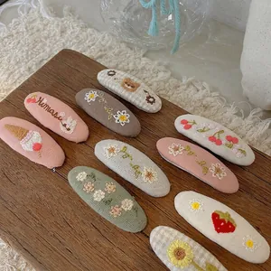 10er-Set handgefertigte bestickte Haarspangen aus Stoff mit Blumen und Früchten