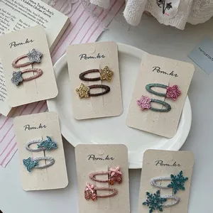 Sparkly star and butterfly hair clips for girls set on elegant display cards