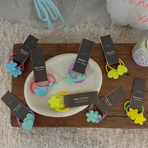 Élastiques à cheveux faits main avec étoiles et cœurs en couleurs pastel pour enfants