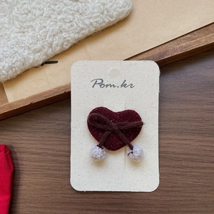 Handmade red heart hair clip with dark red felt material and a brown bow decoration