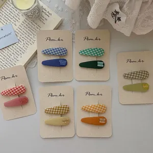 Set di 12 fermagli per capelli in tessuto a quadri per bambine in colori pastello