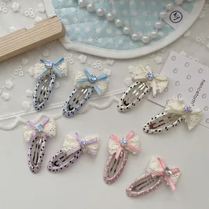 Set di 8 fermagli per capelli con fiocchi a pois, pizzo e strass brillanti per bambine