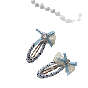 Set di due fermagli per capelli a pois color crema con pizzo e accenti di cristallo