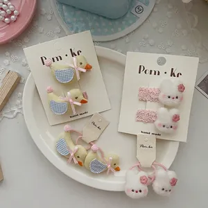 Set de pinzas para el pelo infantiles con pato y conejo, lazos de encaje y pompones suaves