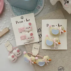 Pinzas para el pelo de peluche con diseño de conejo y pato y lazos para niñas pequeñas