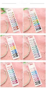 Détail de barrettes BB colorées avec motifs de dessins animés pour filles sur cartes
