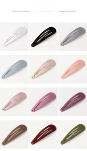Detail showing 12 vibrant candy colors of matte and glossy metal snap hair clips