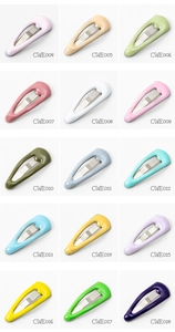 Macro view of 15 colorful 2cm mini pet hair clips in assorted macaron enamel colors
