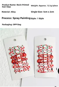 Detail view of 5cm cherry and floral print hair clips set with size and weight specs