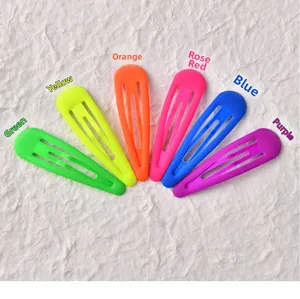 Detailed set of six neon matte metal water drop hair clips in vibrant fluorescent colors