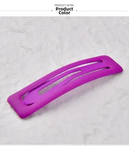 Detail view of the matte purple fluorescent square hair clip on a white background