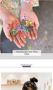 Close-up of colorful matte star hair clips for children in vibrant neon candy colors
