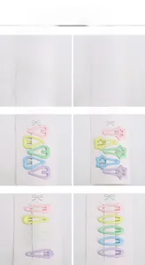 Gros plan de barrettes BB de 7 cm aux couleurs macaron avec des formes de vagues