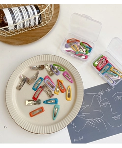 Candy colored metal hair clips set in storage box with rectangle and water drop shapes