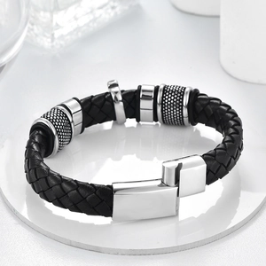 Men's black braided leather bracelet with stainless steel cross and magnetic clasp