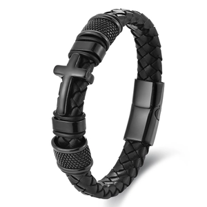 Men's black woven leather bracelet featuring a matte metal cross and magnetic clasp