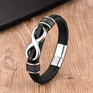 Pulsera de hombre en cuero negro con símbolo de infinito plateado y cierre magnético