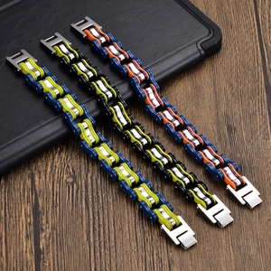 Close-up of hip-hop motorcycle chain bracelets with H-shaped metal clasp detail