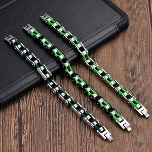 Three men's stainless steel bicycle chain bracelets in black and green industrial style
