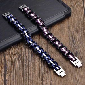 Detail of stainless steel motorcycle chain bracelet with blue and purple plating highlights