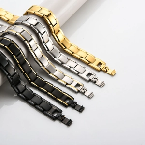 Detail of 12mm stainless steel magnetic bracelets showing various colors and textures