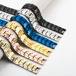 Detail view of double row magnetic bracelets in six various metallic finishes on display