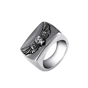 Detailed relief of skull with wings on a vintage stainless steel biker ring for men