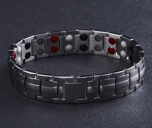 Detail view of double row magnetic therapy elements on stainless steel men's bracelet