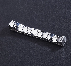 Detail view of double-row magnetic stainless steel link chain bracelet for men
