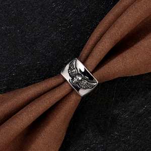 Vintage stainless steel skull ring with wings in a retro punk style for men