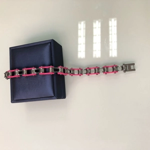 Bracciale a catena di bicicletta industriale con maglie in acciaio rosa e argento