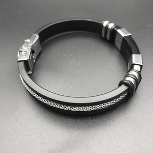 Men's black silicone bracelet featuring silver metal mesh inlay and steel buckle
