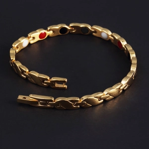 Bracciale magnetico dorato in acciaio inossidabile con maglie a X e pietre colorate