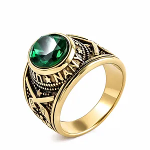Vintage gold stainless steel US Navy ring for men featuring a faceted green gemstone