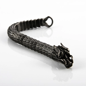 Macro detail of vintage dragon scale texture on retro titanium steel dragon bracelet