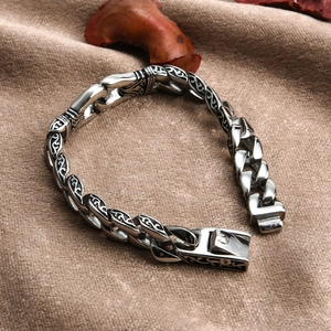 Vintage men's titanium steel bracelet with engraved floral pattern on thick metal links