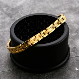 Damen Energiearmband aus Titanstahl mit Goldgliedern und Magnettherapie-Design in Gold
