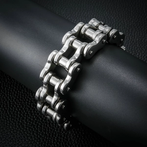 Men's retro rock motorcycle chain bracelet in silver stainless steel on display stand