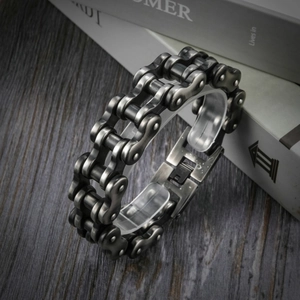 Close-up of retro industrial bike chain bracelet in brushed stainless steel
