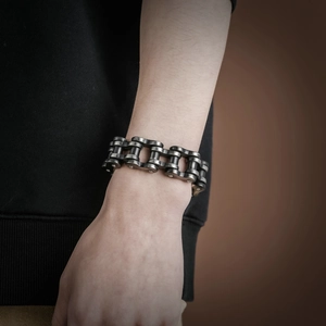 Industrial style dark grey stainless steel motorcycle chain bracelet for men worn on wrist
