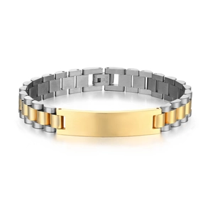Macro detail of 12mm dual-tone stainless steel link bracelet with gold engravable plate