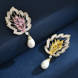 Elegant maple leaf brooches with sparkling zircon, colorful gems, and white pearl drops