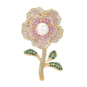 Luxury floral brooch with colorful zircons and a white pearl on a gold-plated base