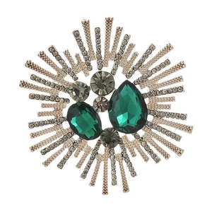 Elegant gold sunburst brooch with emerald green crystals and smoky gemstones