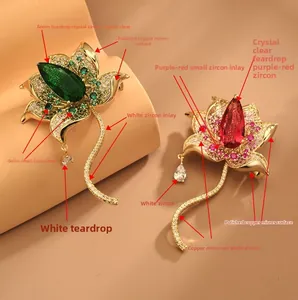 Detailed view of gold-plated lotus brooches with micro-set zircons and crystal petals