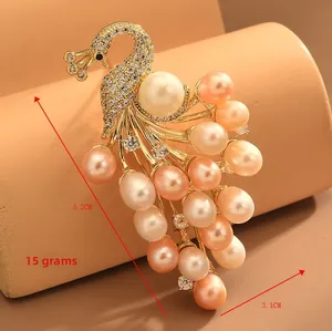 Detailed view of peacock brooch dimensions 5.2cm by 3.1cm with elegant pearls and crystals