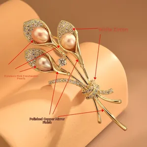 Macro detail of calla lily brooch with pink freshwater pearls and micro-paved zirconia